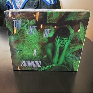 The Life of a Showgirl Deluxe CD It’s Rapturous Edition NEW AND SEALED
